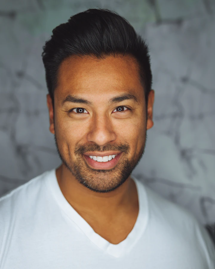 Smiling man in a white shirt, sample portrait